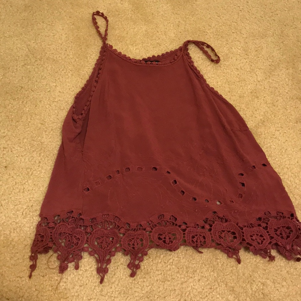 maroon top with floral pattern